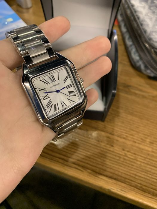 Часы Cartier.