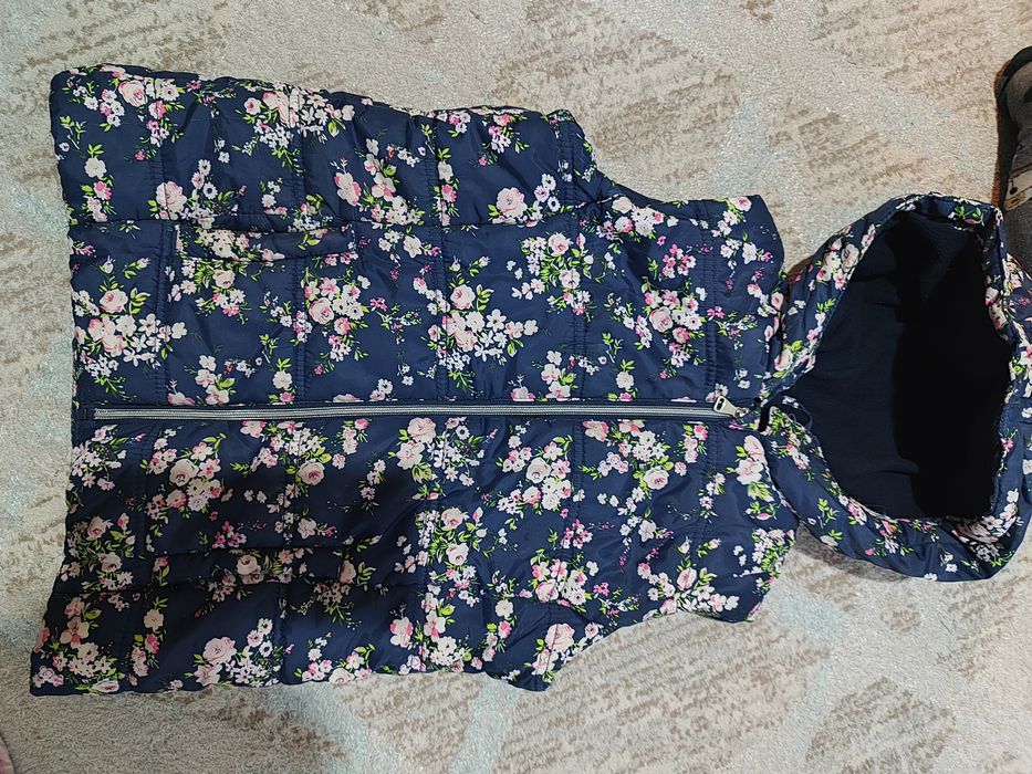 Жилетки, безрукавки