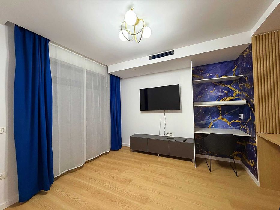 Închiriez apartament 2 camere, central, ultramodern, bloc nou 2026, prima închiriere, loc parcare inclus