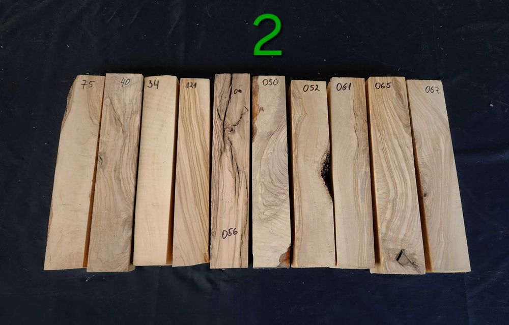 Заготовки (трупчета) от маслиново дърво (дървен материал)