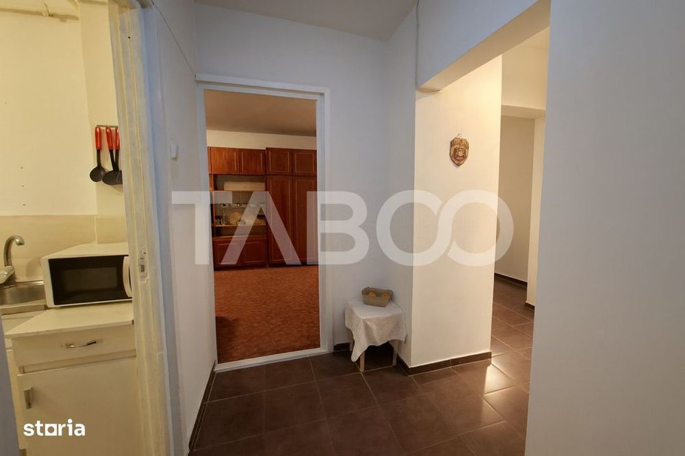 Apartament etaj 1 de vanzare 3 camere 2 bai balcon pivnita Cisnadie