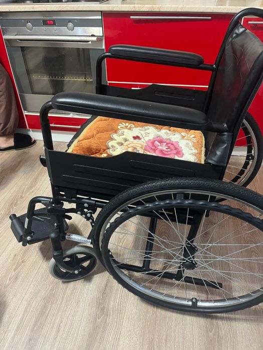 Коляска для инвалидни