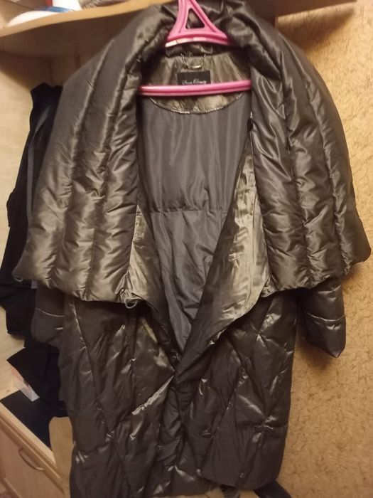 Продам Пуховик .