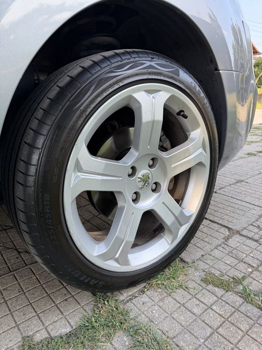 Джанти с гуми PEUGEOT/CITROEN 18цола 4x108