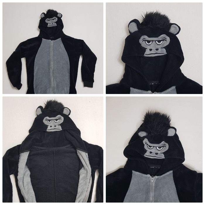 Pijama intreaga animal print tip salopeta , pufoasa, cu fermoar, glugă