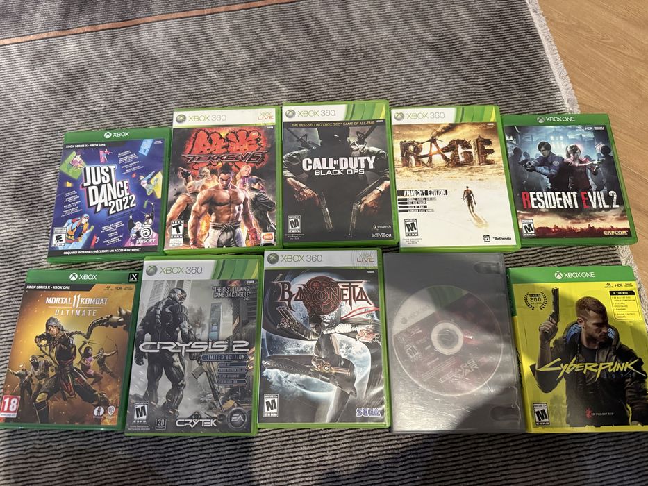Xbox One X 1 TB + 2 оригинальных геймпада + 10 игр