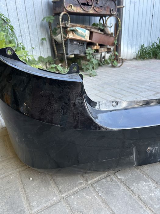 Продам бампер Гранта задний (седан)