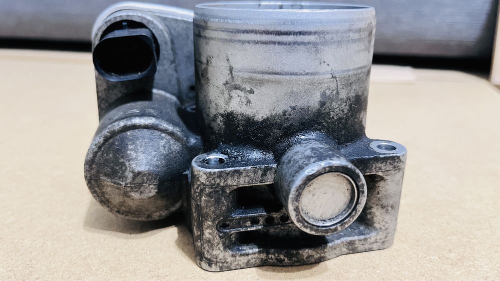 Дросешьная заслонка Гольф 4