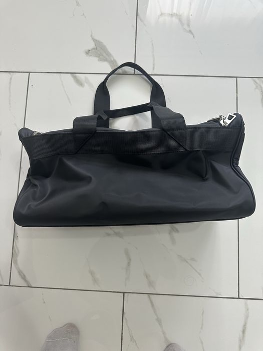 Geamantan versace de mana