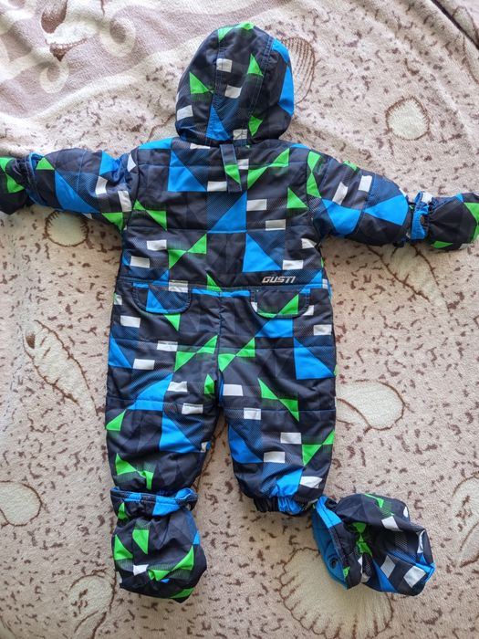 Продам зимний комбинезон Gusti