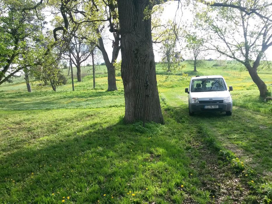 Vand sau schimb teren intravilan6,5ha si constr. la 40 km de Cluj