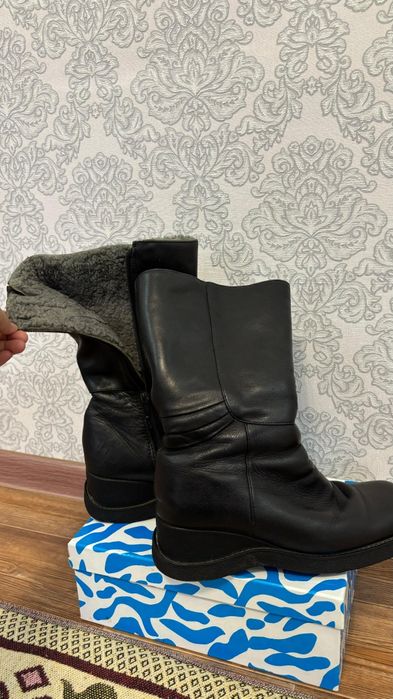 Продаю кожанные сапоги