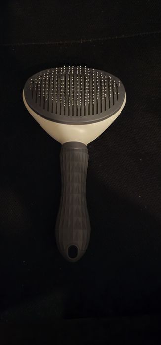 Четка за лесно събиране на косми от домашни любимци