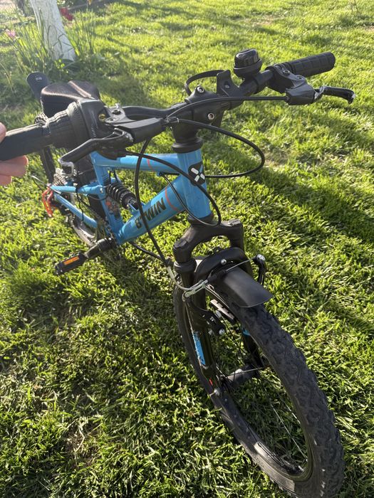 Bicicleta Btwin 20inch cu suspensii albastra