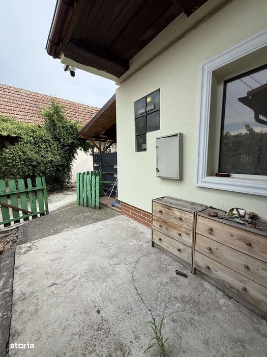 Apartament la curte comuna, 2 camere, 48 mp utili si teren comun 550 m