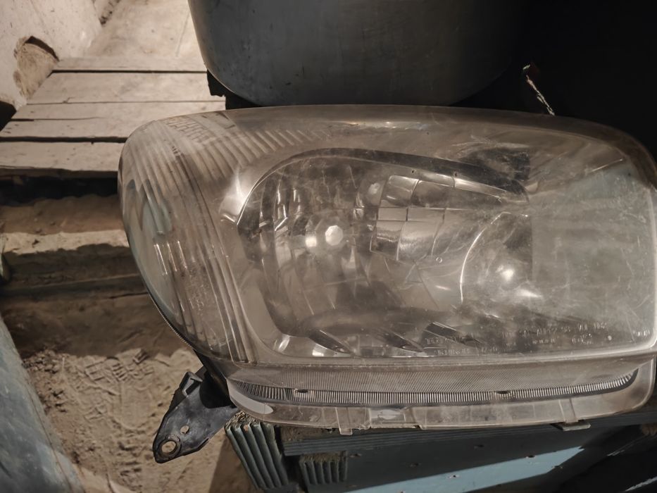 Фара передняя Раф 4