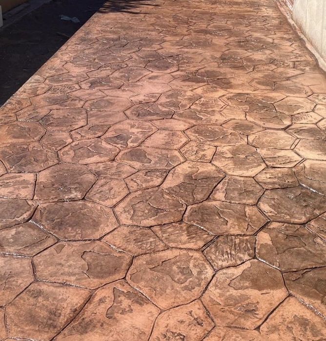 Pardoseli din beton amprentat/elicopterizat(120 ron/mp)