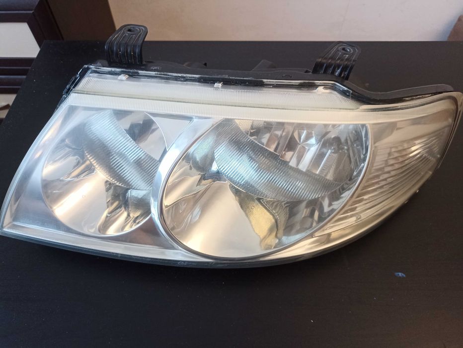 Фара Ниссан Альмера Классик оригинал