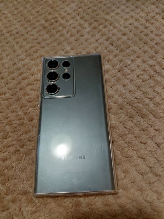 Samsung s23 ultra телефона е добро застояние телефона има зарядно и 4 гръбчета 512 гб е и 12 рам