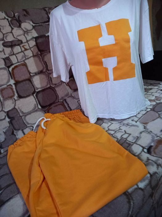 Lot haine damă  în condiții bune