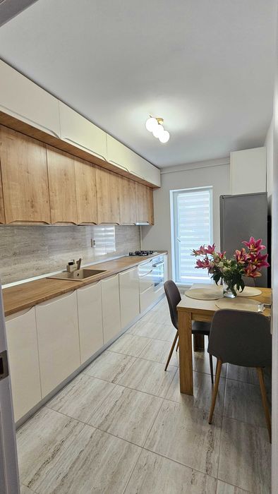 Apartment 2 camere de inchiriat! 10 min metrou. Parcare acoperita. 71mp. 2 balcoane. Bloc nou. Etaj 1