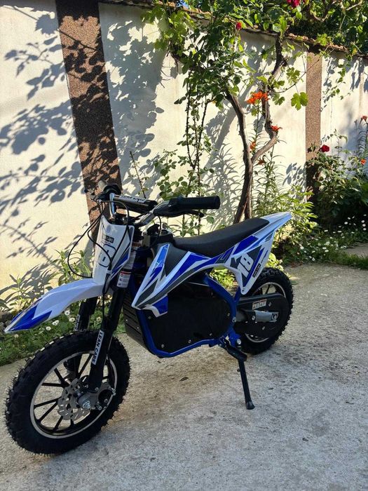 Motocicleta electrica pentru copii(aproximativ 12 ani) ca noua