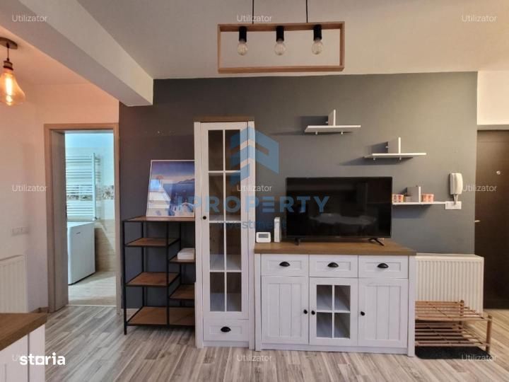 Apartament 2 camere 1 Mai complet utilat si mobilat cu centrala propri