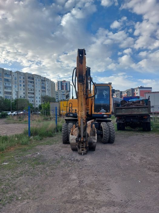 Услуга эксковатора колесный