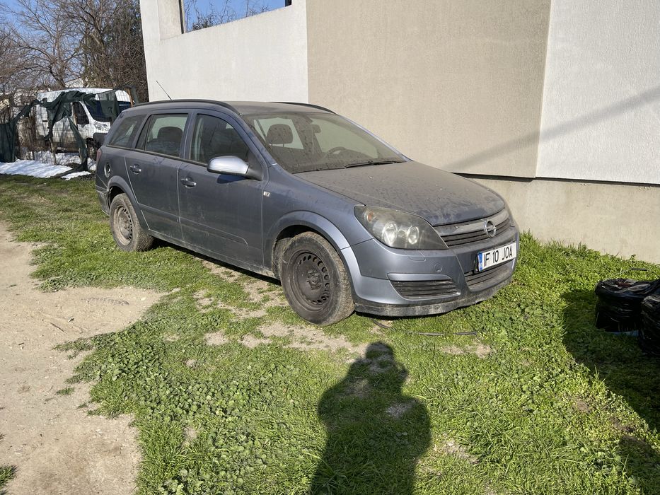 Macara geam motoras broasca usa opel astra h