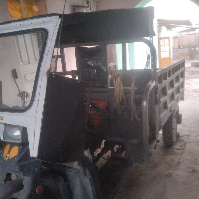 Мотоцикл келишган холда