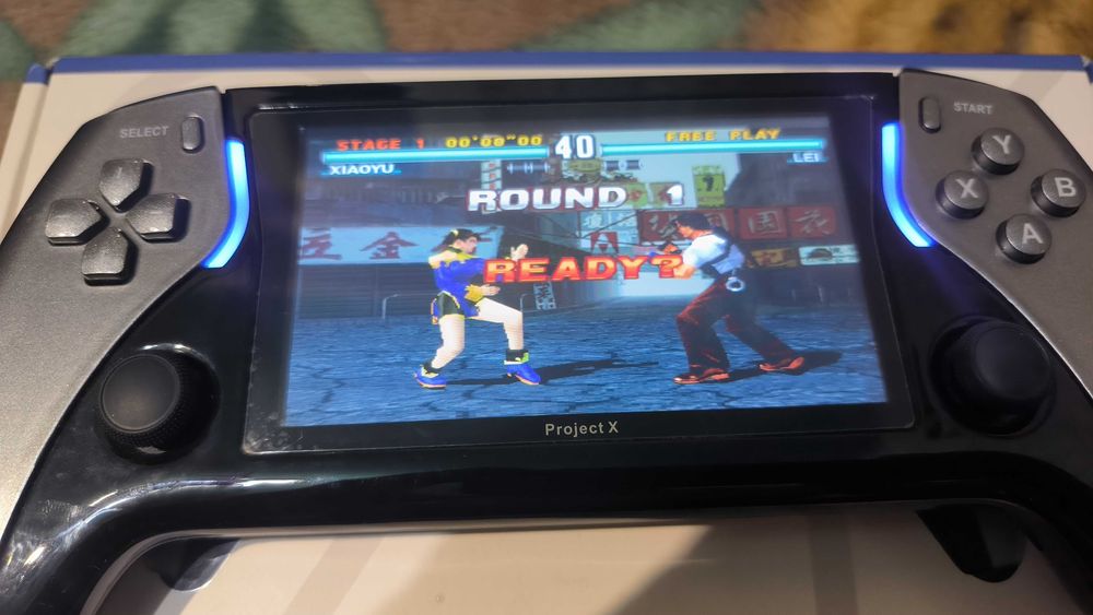 Продам портативную консоль Project X.