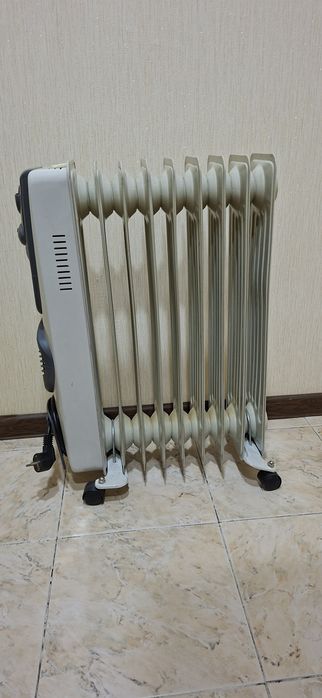 Маслянный обогреватель