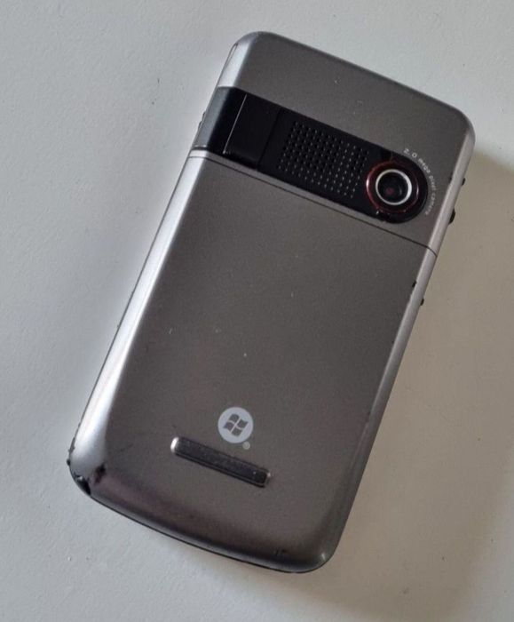 Telefon Asus cu încărcător