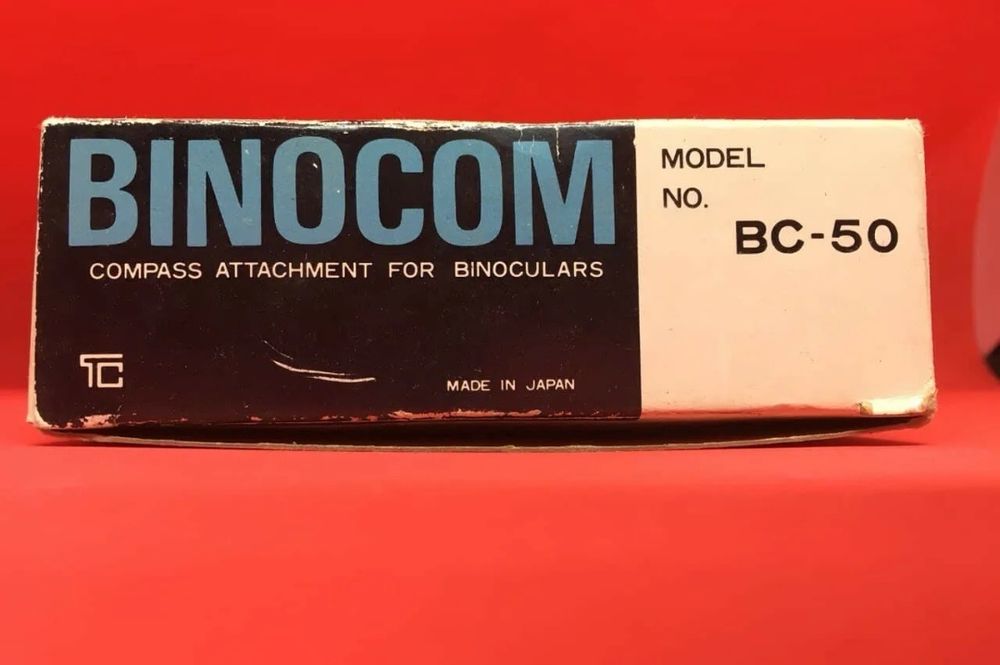 Compas atașabil pentru binoclu