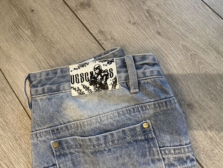 Джинсы сакура,размер L