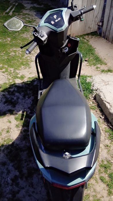 Schimb mașină manuală si scuter electric pe o  masina automată.