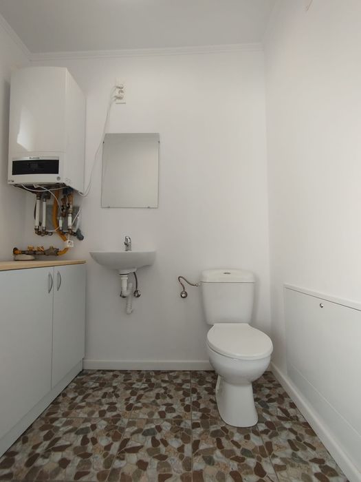 Casa tip duplex.