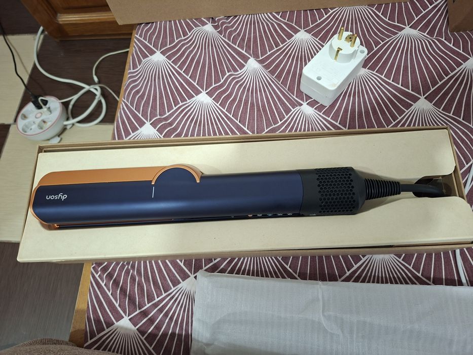 Placa Dyson pt indreptat si uscat parul in acelasi timp