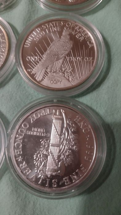 Lot 3  bucati (uncii )argint dolari U.S.A