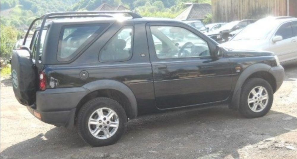 Aripa stanga dreapta Land Rover Freelander td4 negru cod culoare 697