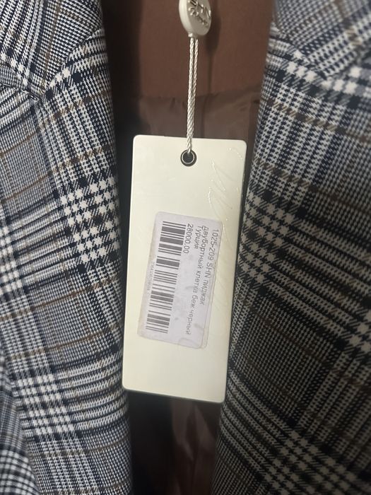 Новый пиджак в клетку  38 р