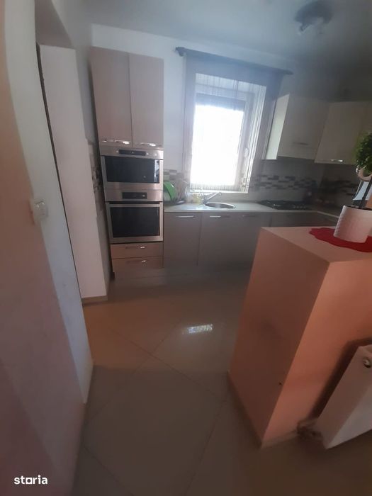Casă cu 4 camere și curte spațioasă