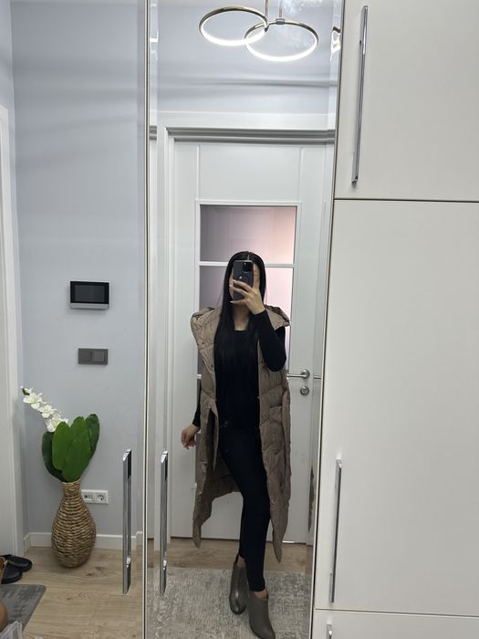 Жилетка пуховая