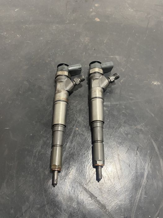 Injector BMW Seria 3 E90 E91 320d 163 cp 7793836 Seria 1 E87 E60 520