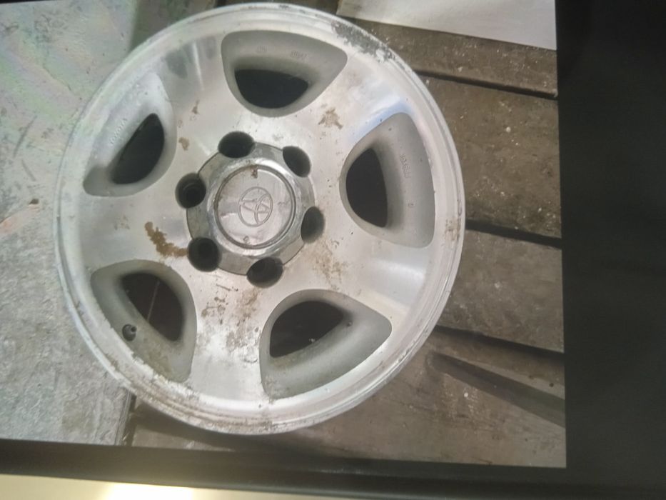 Продам бу диск на LC 80. На запаску. Оригинал 16 размер.