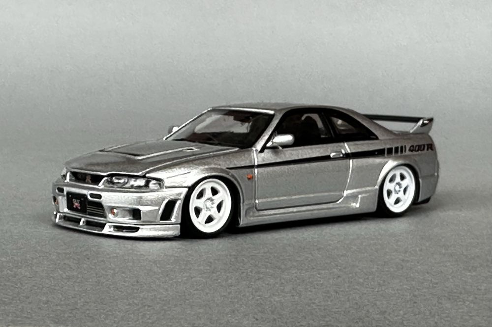 Macheta 1:64 Nissan R33 Nismo GTR ( nu tarmac hot wheels )