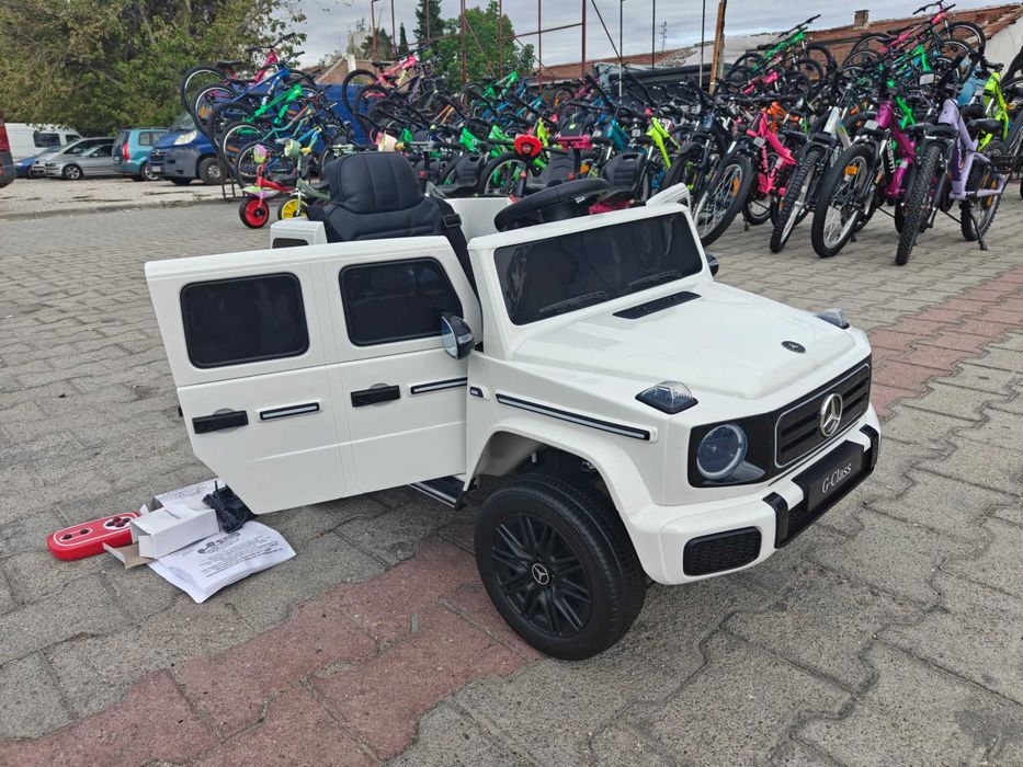 MERCEDES Акумулаторен джип Mercedes-Benz G580 бял