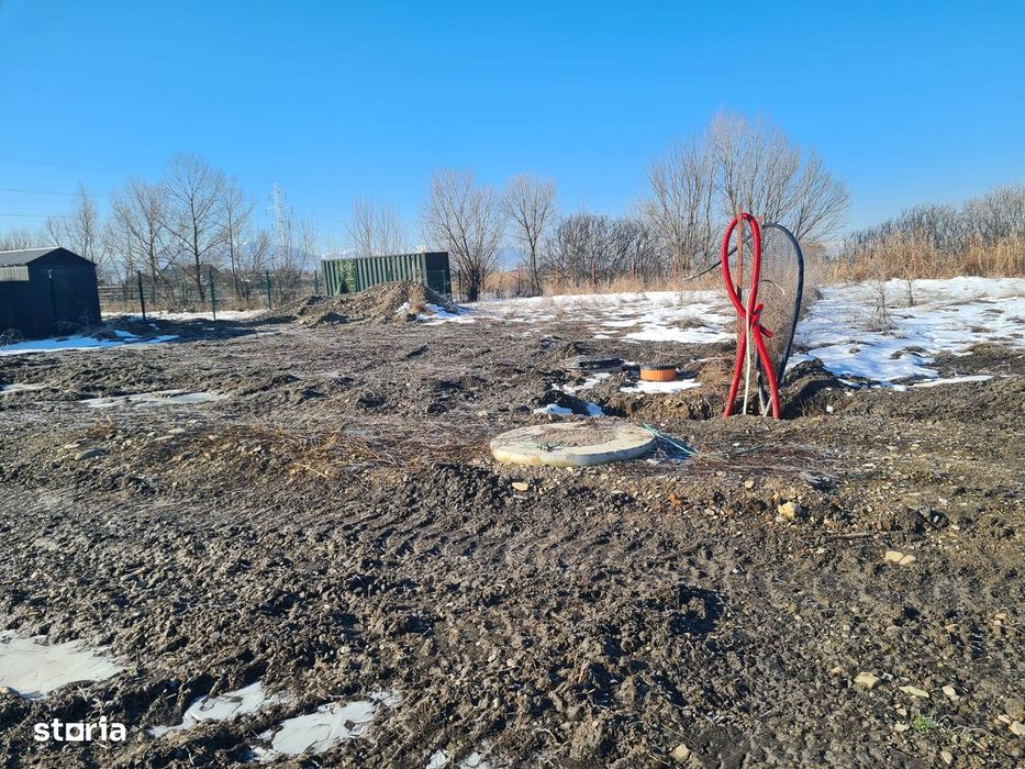 Teren intravilan,ingradit cu utilitati.