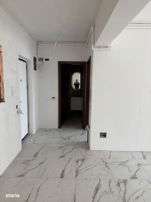 Aparatment 52 mp + Curte Proprie 55mp + Loc de parcare Subteran