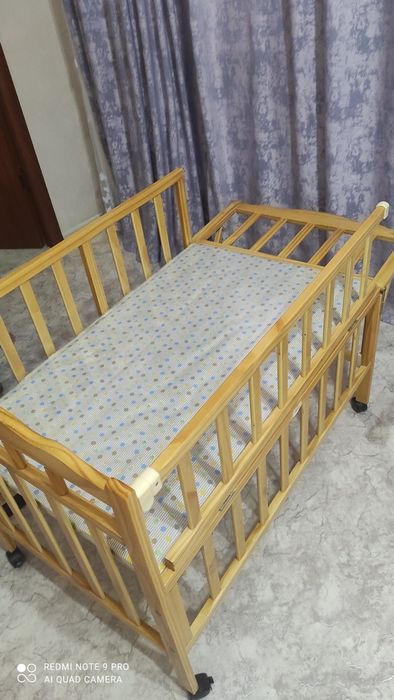 Детская кроватка с люлькой